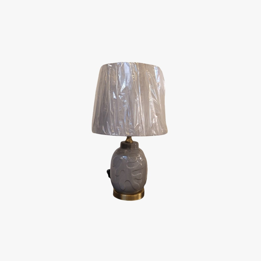 Modern Embossed Porcelain Table Lamp with Black Shade and Gold Accents