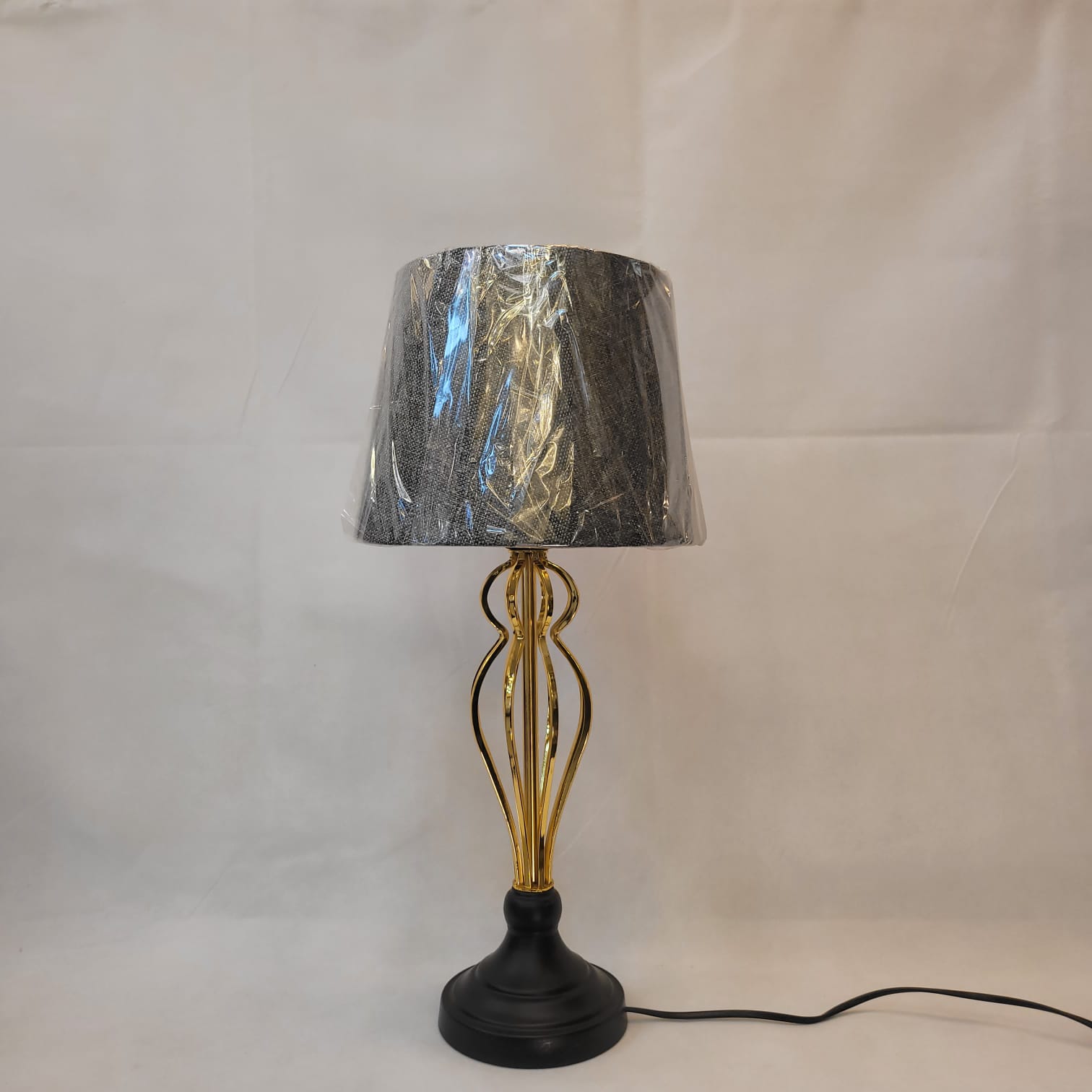 Contemporary Gold Accent Table Lamp with Black Shade